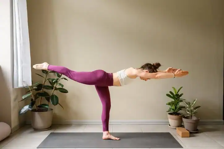 Woman doing Yoga exercise Eastleigh  to help with toning the body. 